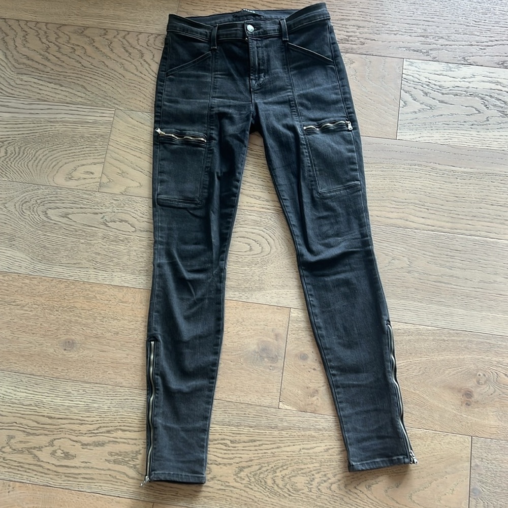 J Brand black skinny with zippers and pocket details. Size 27.